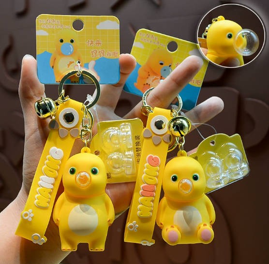 正版解压吹泡泡奶龙钥匙扣女男可爱立体公仔减压玩具书包礼品批发
